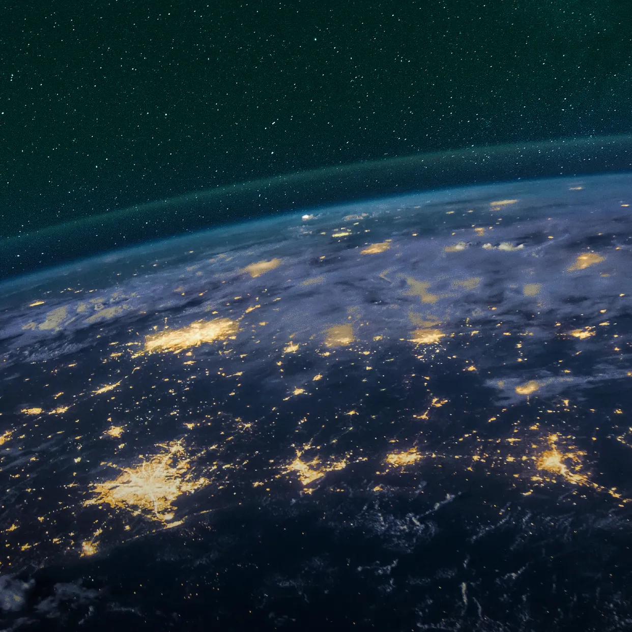 Earth as seen from space, electric lighting visible, night